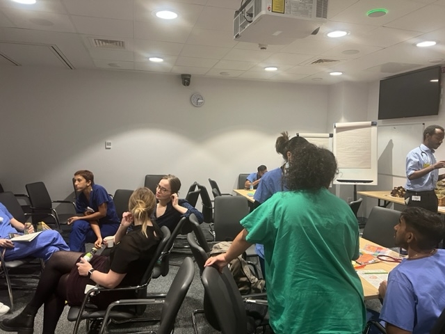 people in a room chatting